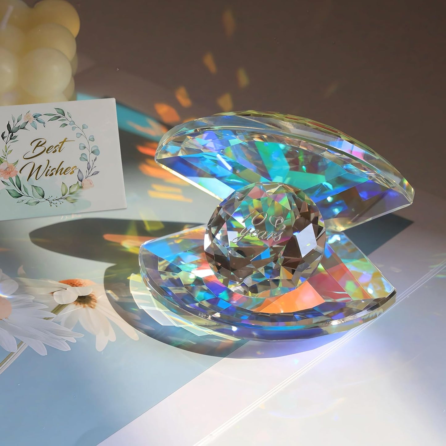 Elegant 10th anniversary crystal gift for her featuring a multi-faceted design reflecting vibrant colours