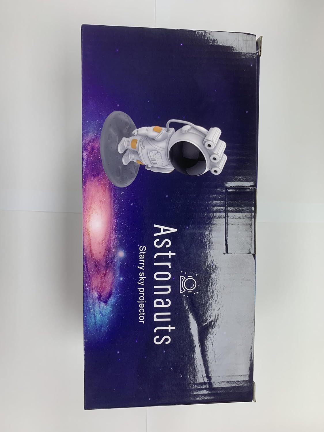 SZPACMATE astronaut galaxy star projector box showing a space-themed design with an astronaut figure
