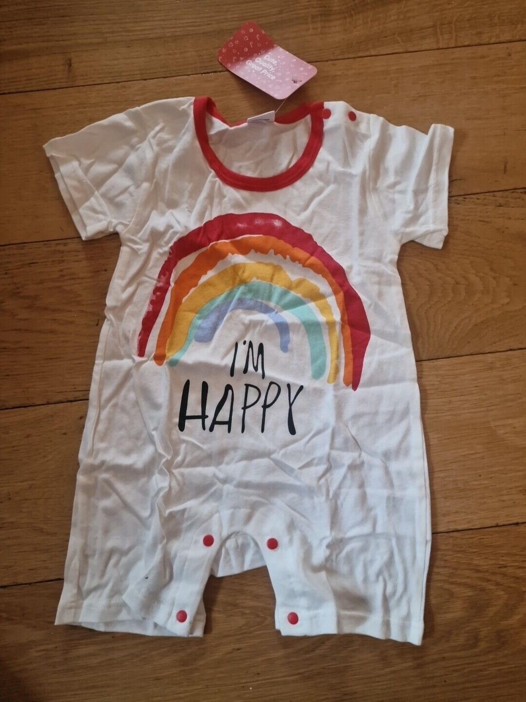 Baby romper 6-8 months white with rainbow and I'm Happy text
