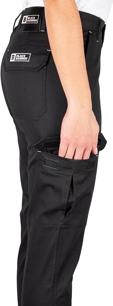 Black Hammer cargo pants size 14 in black with multiple pockets shown on model wearing white shirt