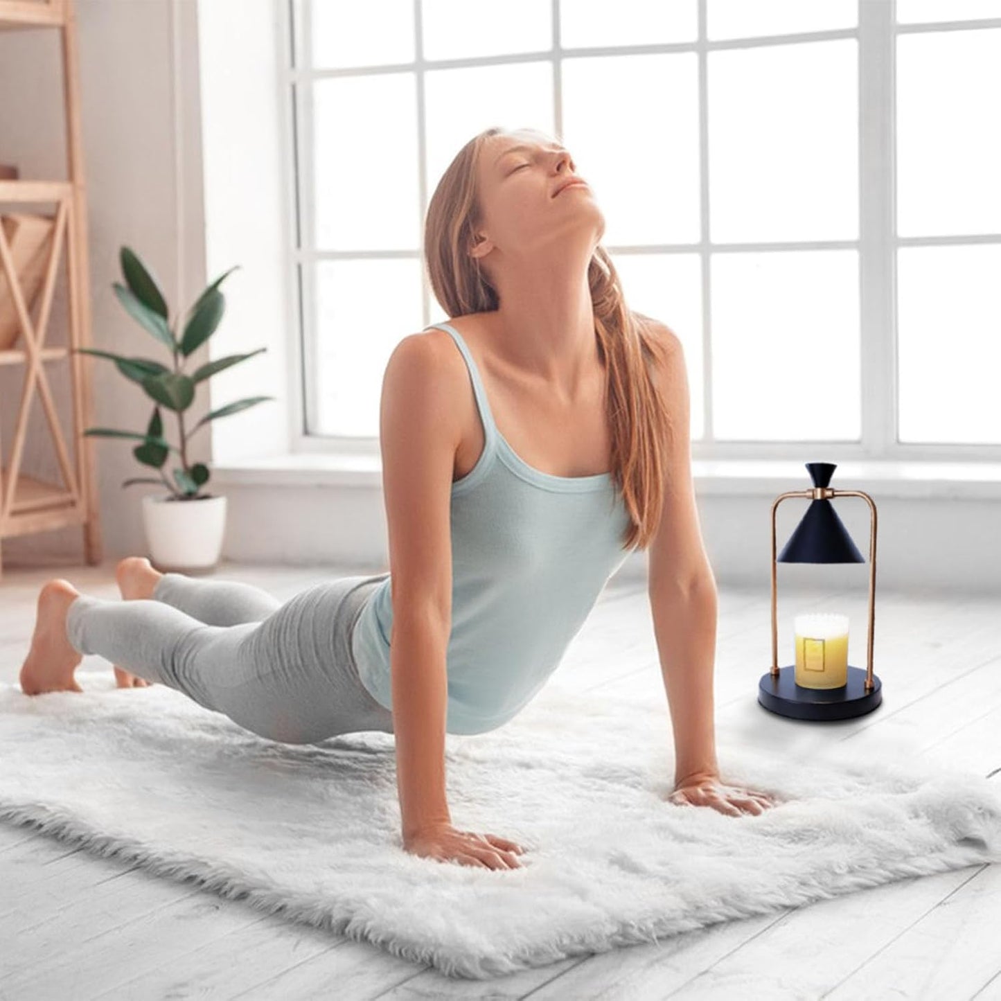 Rainbean candle warmer lamp with timer illuminating a home yoga space with a serene atmosphere
