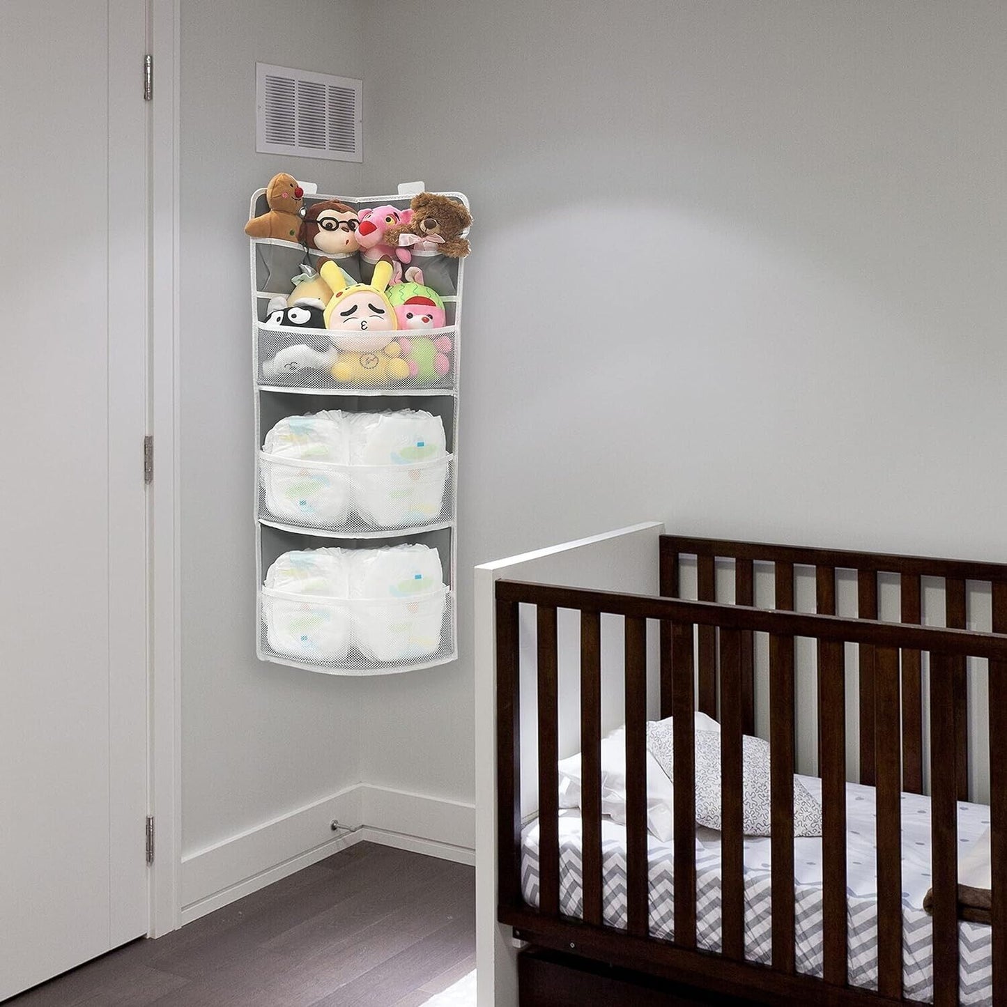 JarM corner hanging 3 tier shelf in a nursery for storing toys and diapers