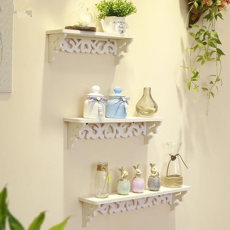 Whimsical decorative floating shelves set in white with intricate designs for stylish home decor