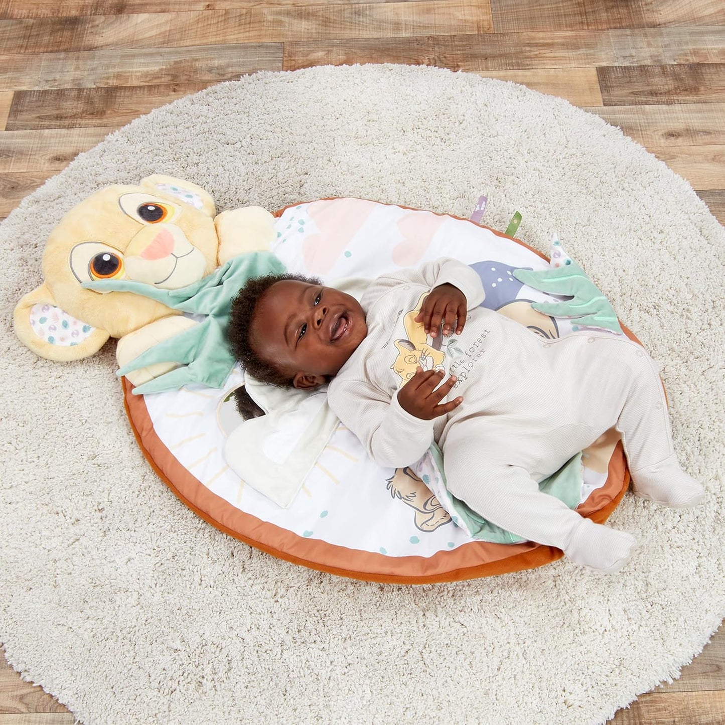 Disney Lion King playmat for babies featuring a plush Simba head and soft textures for fun playtime