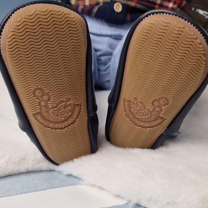 Sole of Dotty Fish barefoot leather shoes for children showing flexible design and grip for active play
