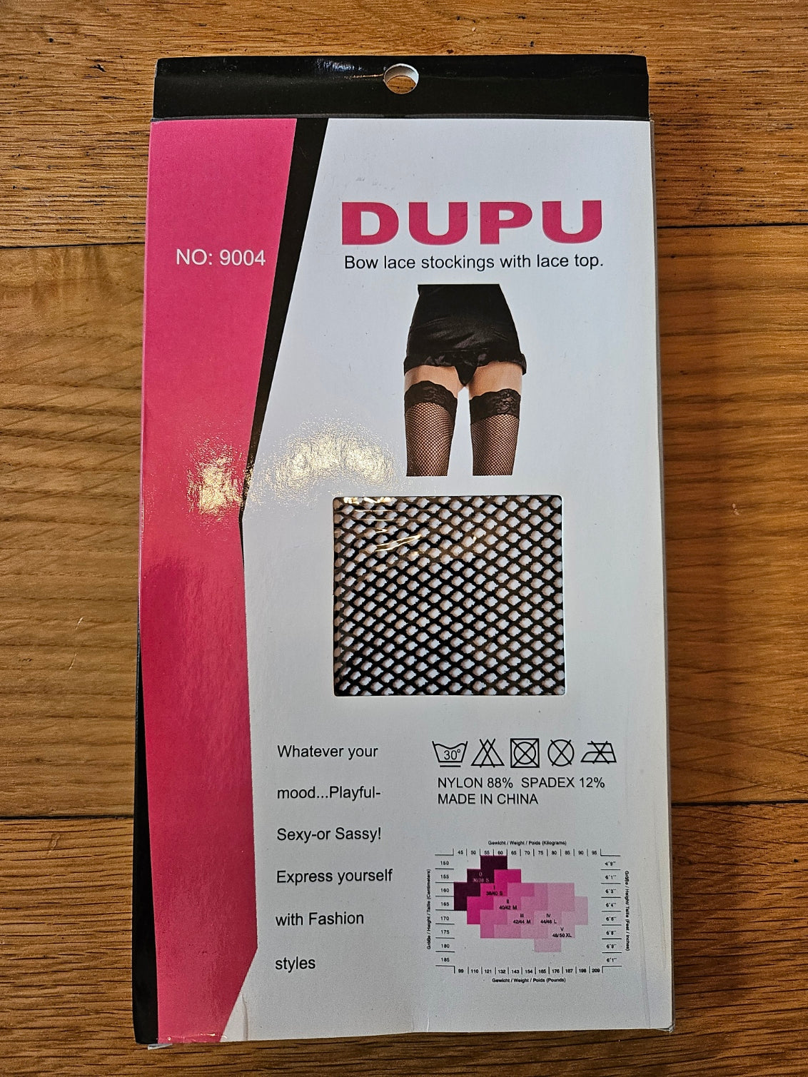 Dupu black lace stockings with lace top, featuring a playful and sassy design for stylish outfits