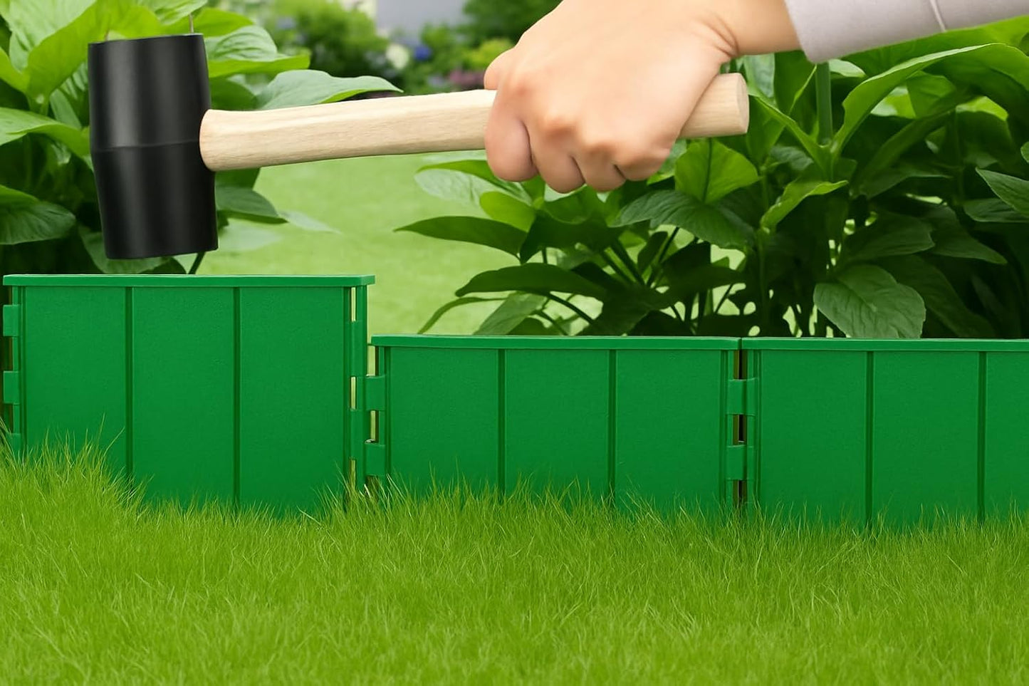 Gardenix easy install lawn edging being secured with a mallet in a garden setting