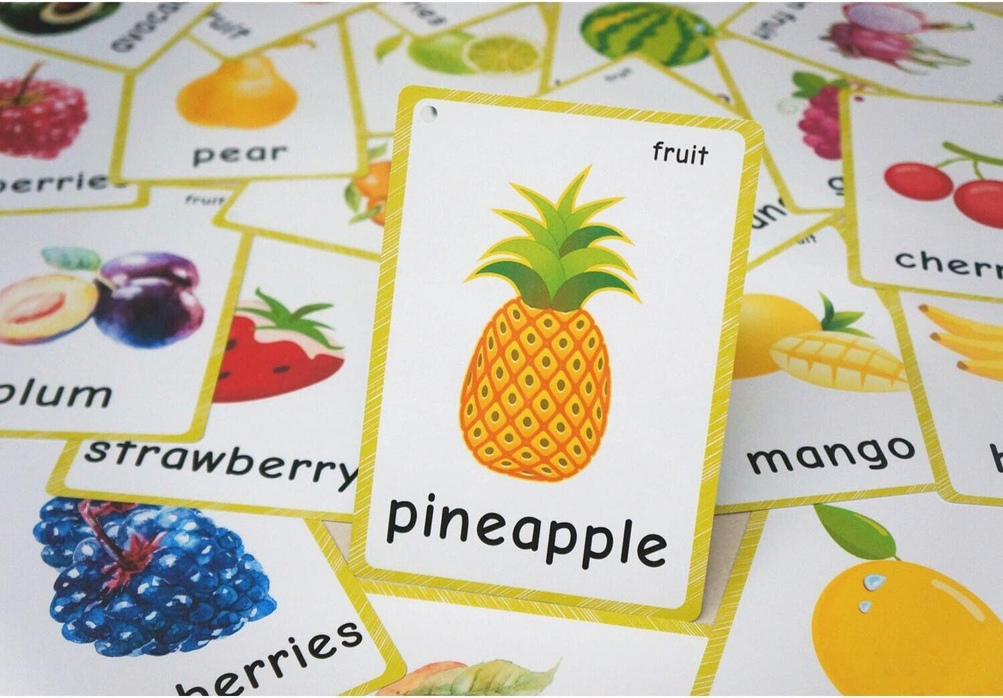 English fruit flash cards featuring a pineapple with colorful illustrations of various fruits