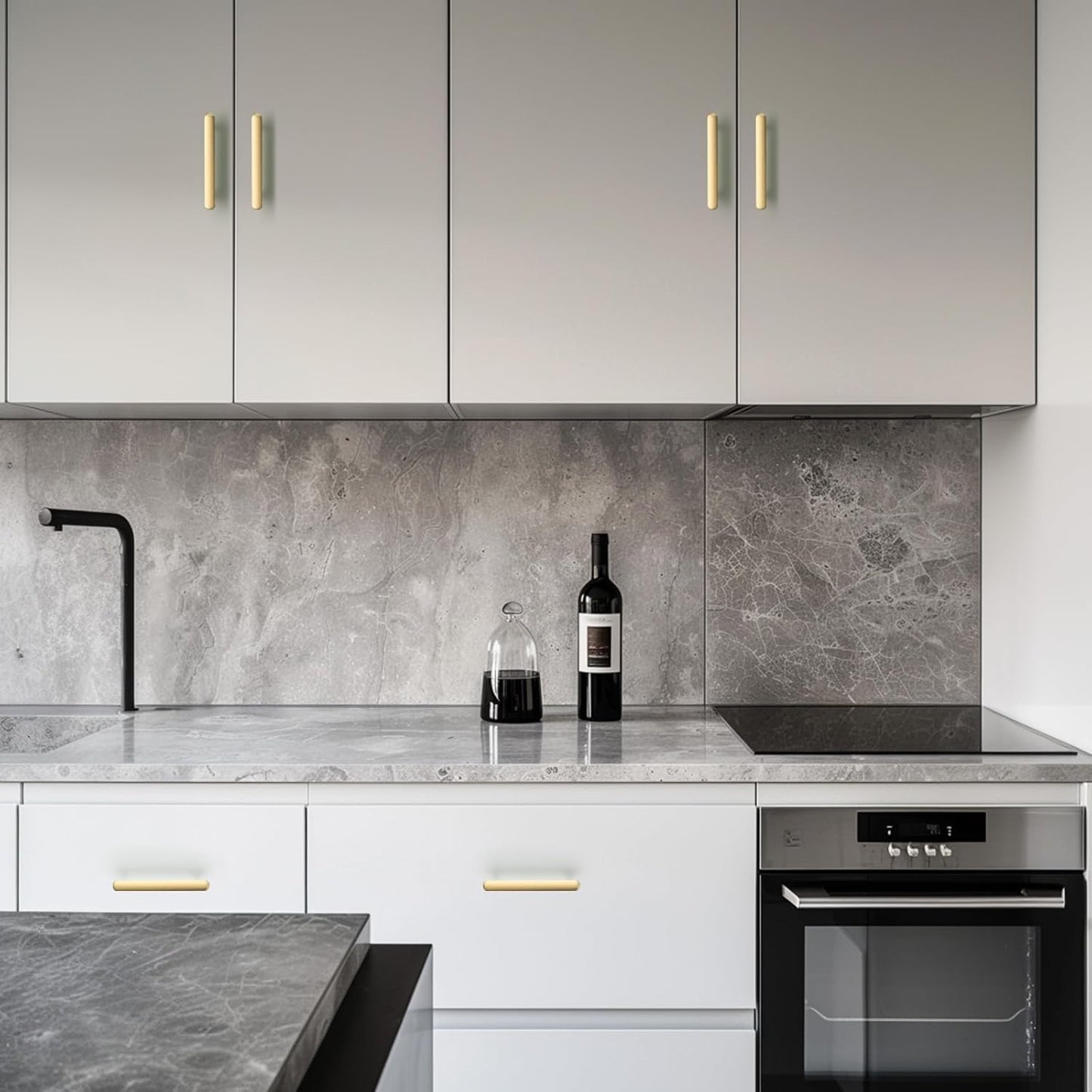 Stylish gold cabinet handles 96mm on modern grey kitchen cabinets with marble countertop