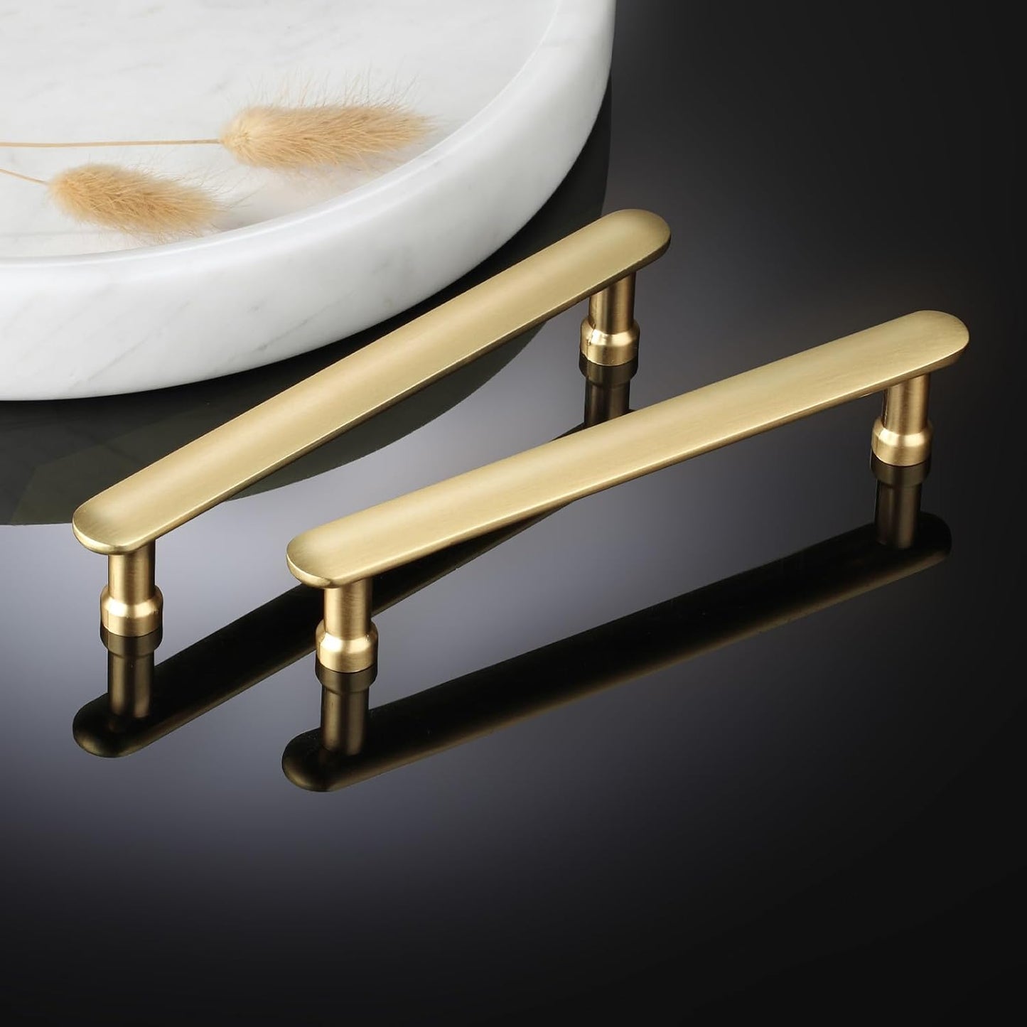 Aititan gold cabinet handles 96mm set on a sleek black surface, perfect for modern kitchens