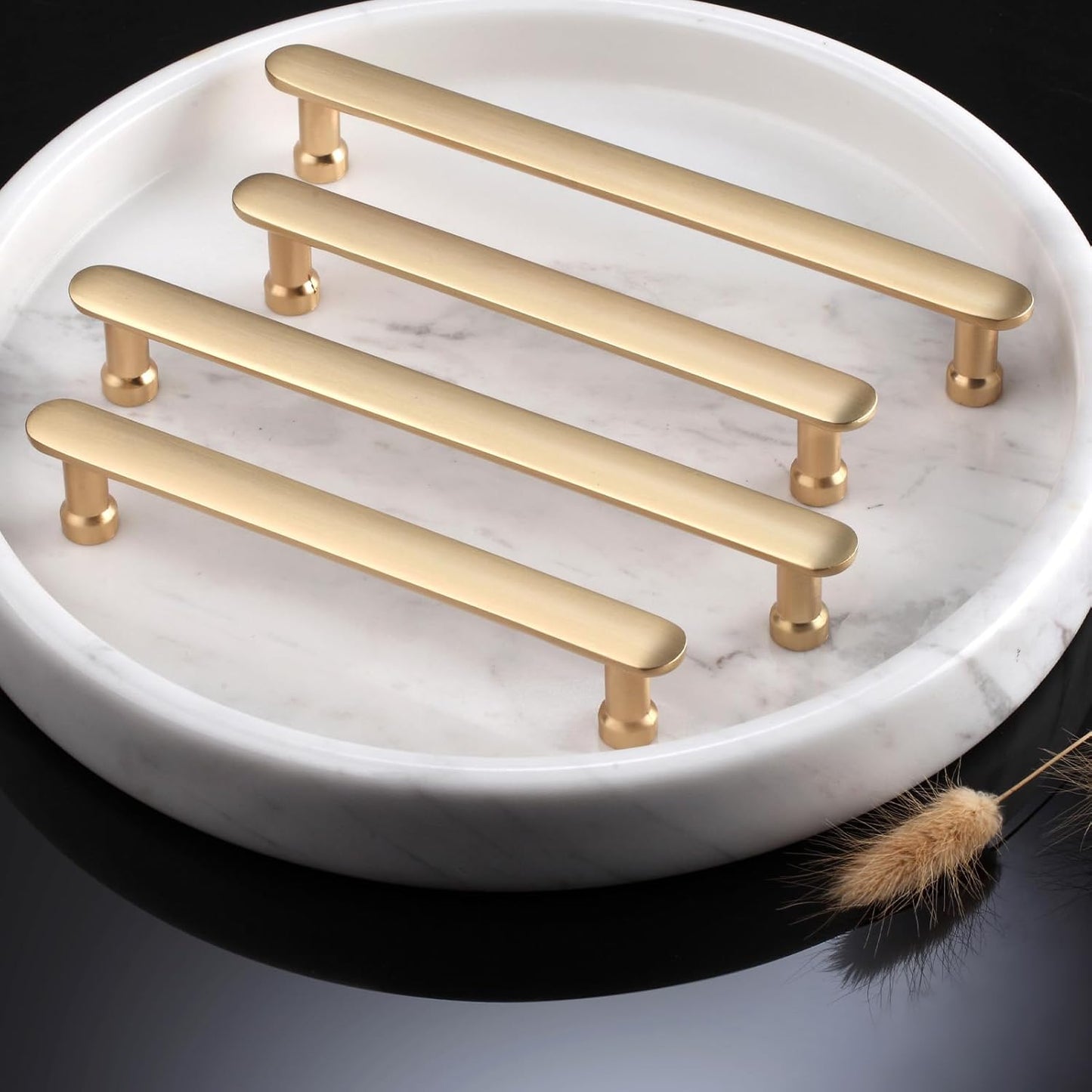 Aititan gold cabinet handles 96mm displayed on a marble tray for stylish kitchen upgrades