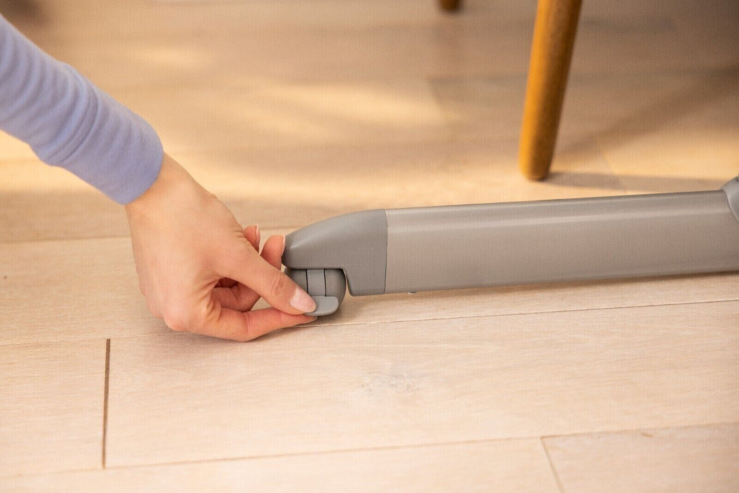 Adjustable leg feature of the GRACO bedside crib for newborns ensuring stable fit next to the bed