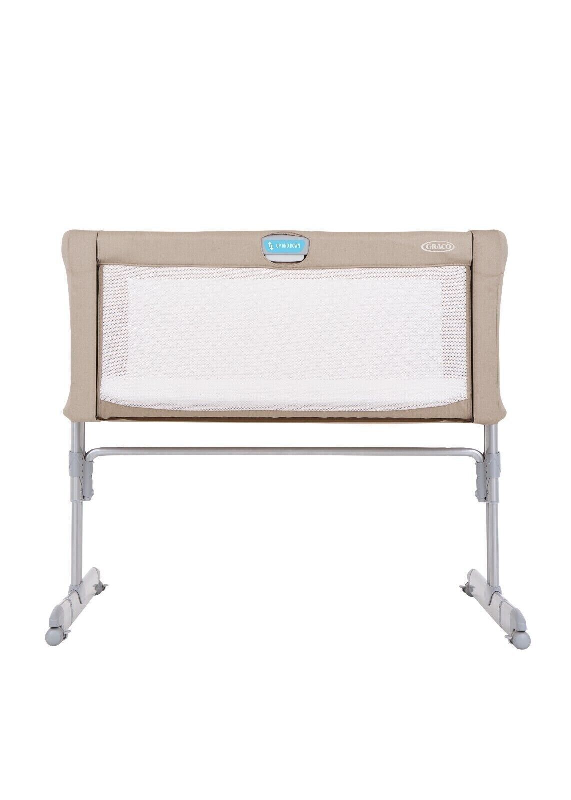 GRACO bedside crib for newborns with mesh sides and a sturdy frame for safe sleeping
