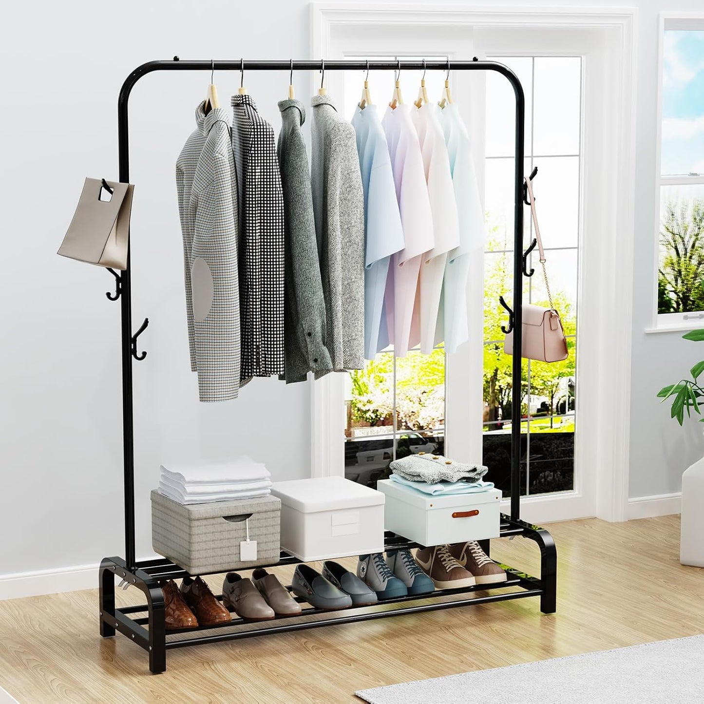 LOEFME heavy duty clothes rail for bedroom displaying stylish outfits and organised storage underneath