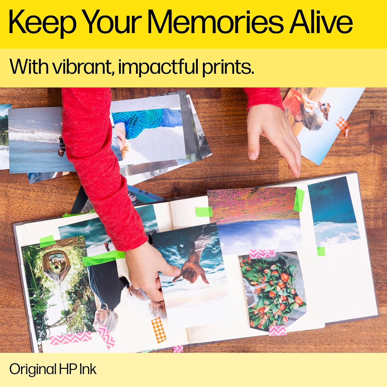 Person arranging photos in an album using HP 62XL black ink cartridge for vibrant printing