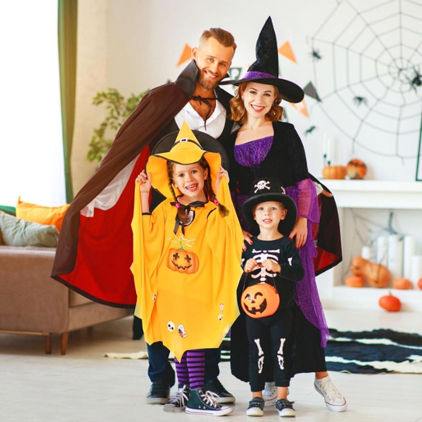 Family in Halloween costumes featuring kids Halloween bat costume for spooky celebrations
