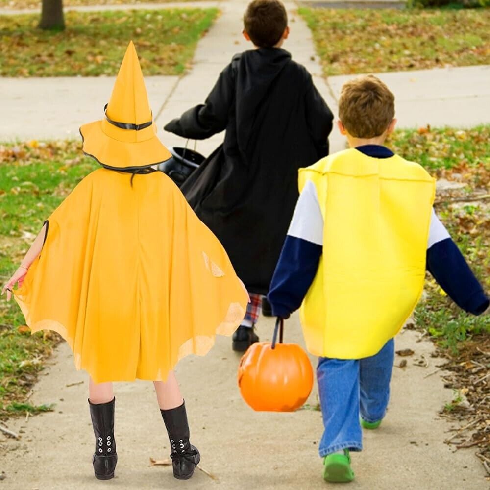 Kids Halloween bat costume with a yellow cape, walking towards a Halloween celebration