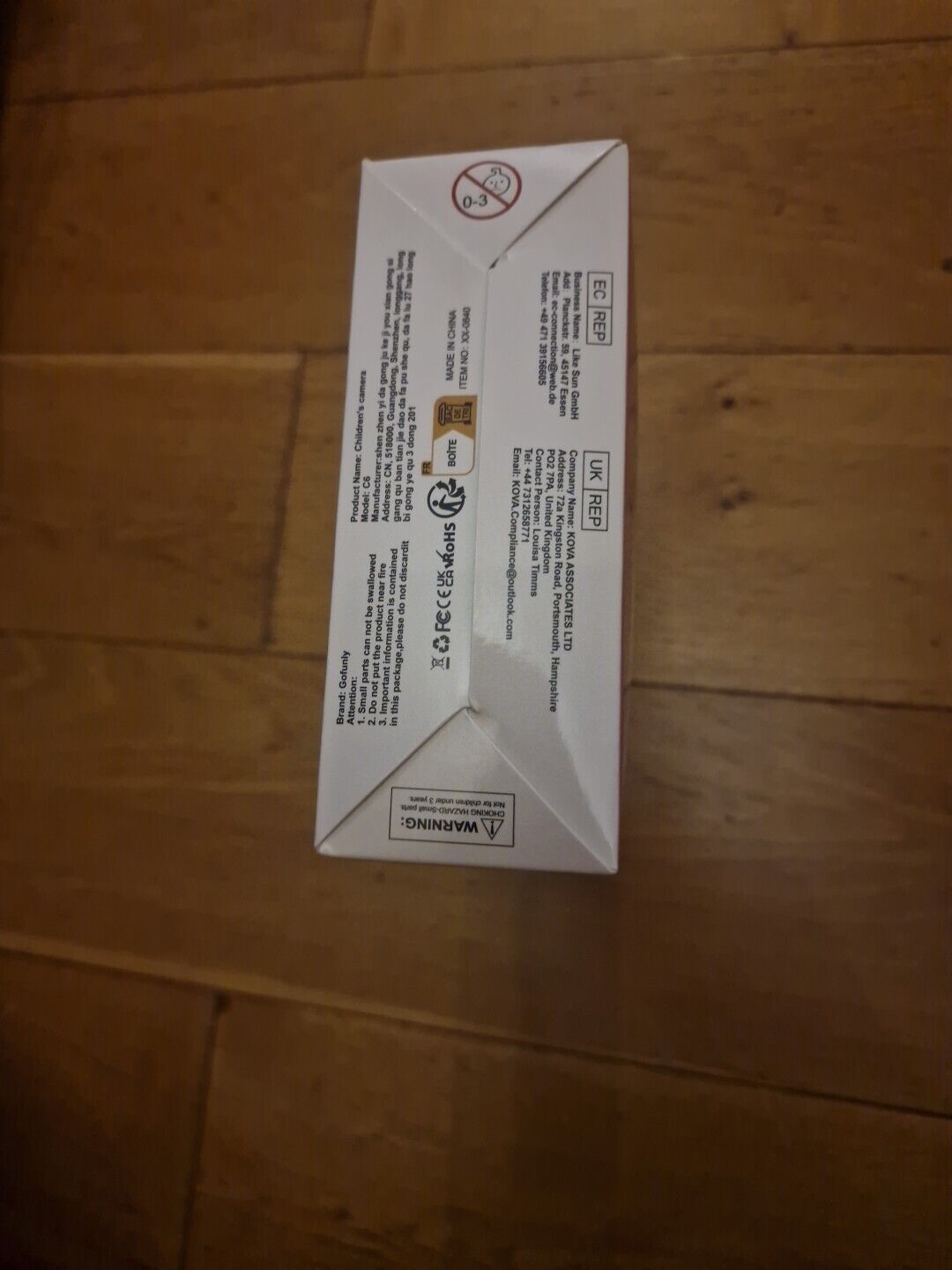Box packaging for kids instant digital camera with safety warnings and product details