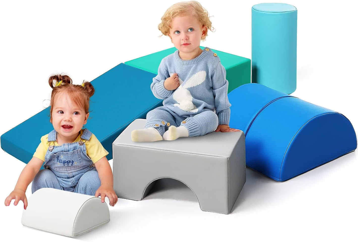 Two toddlers playing on a colourful kids soft play set indoor with various shapes and sizes
