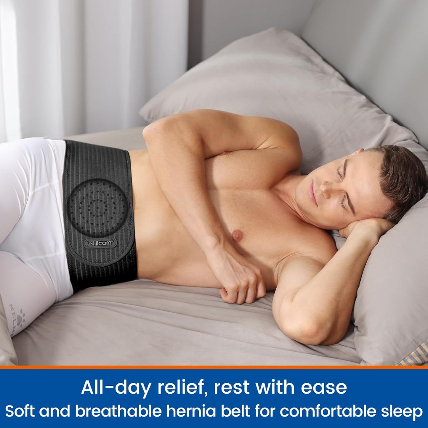 Man relaxing in bed wearing a large umbilical hernia belt for all-day comfort and support