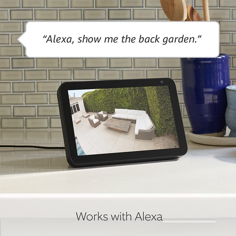 Ring Floodlight Cam Black displayed on a smart device showing a backyard view for security monitoring