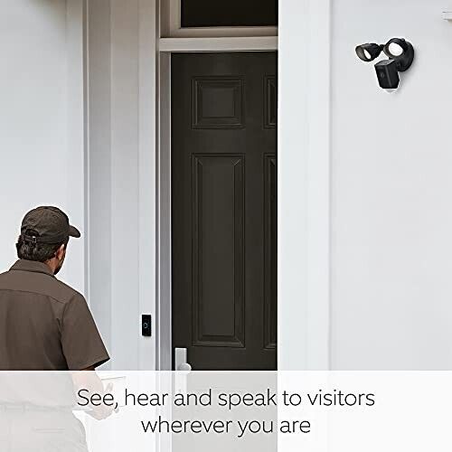 Ring Floodlight Cam Black mounted by a door for monitoring visitors with clear audio and video