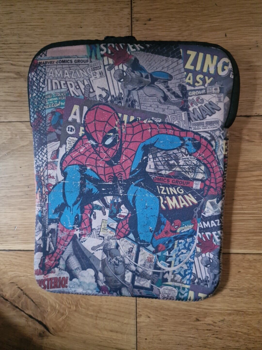Spiderman iPad sleeve case featuring vibrant comic book artwork and durable protection