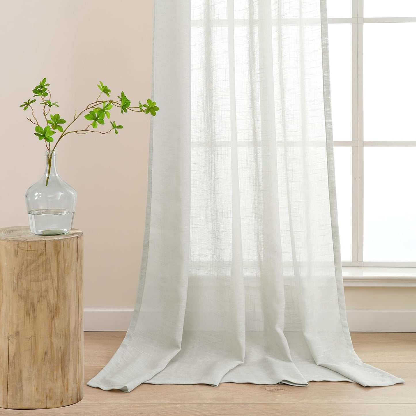 L.Z.E silver grey semi sheer kitchen curtains elegantly draping in a bright, modern kitchen setting