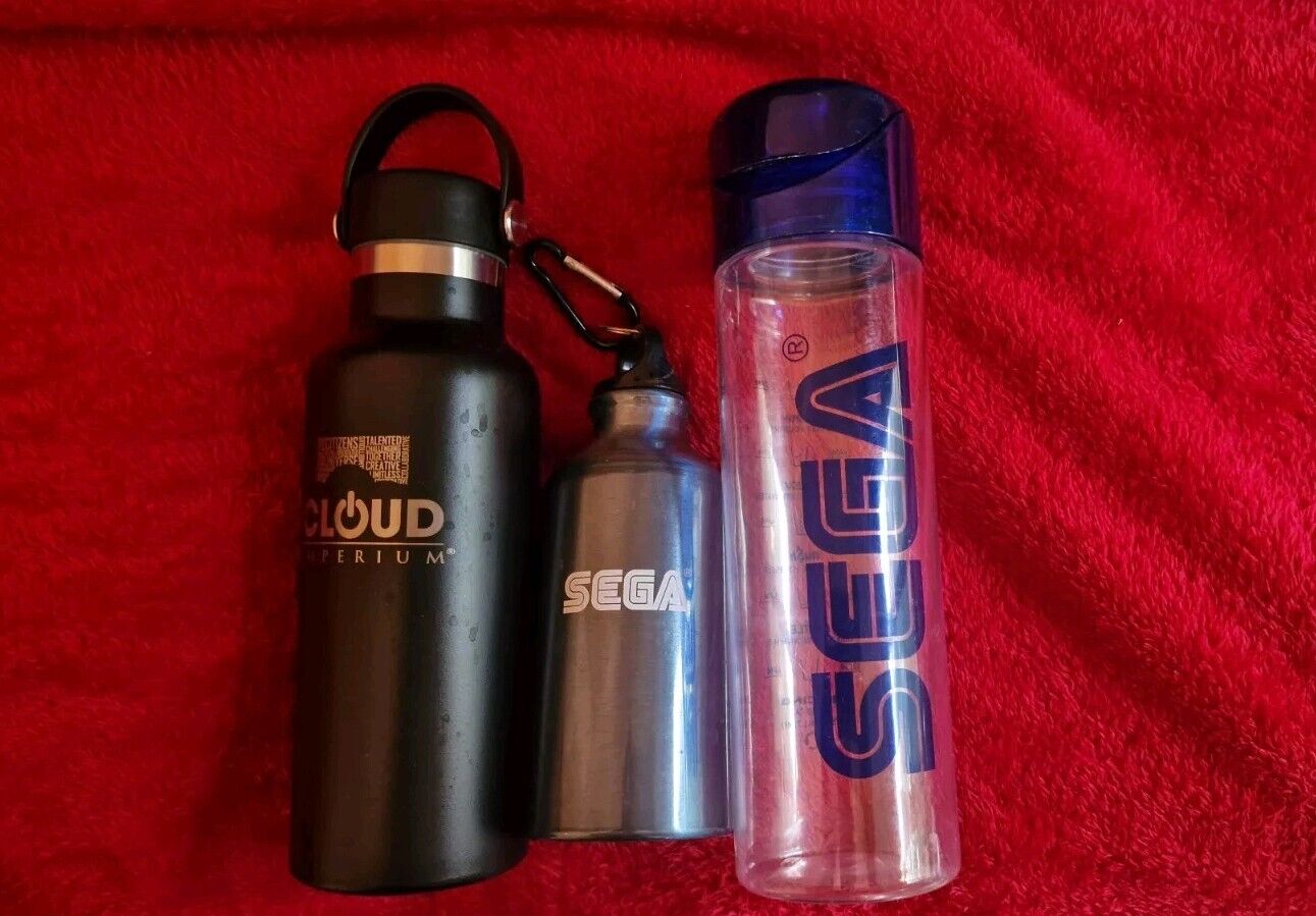 Assorted video game water bottles including black, silver, and clear designs for gamers