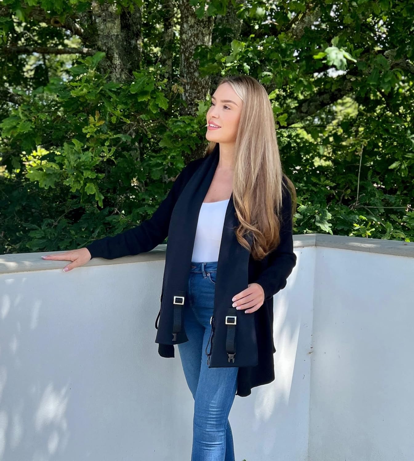 Stylish maternity cardigan with baby carrier in black, perfect for new mothers on the go