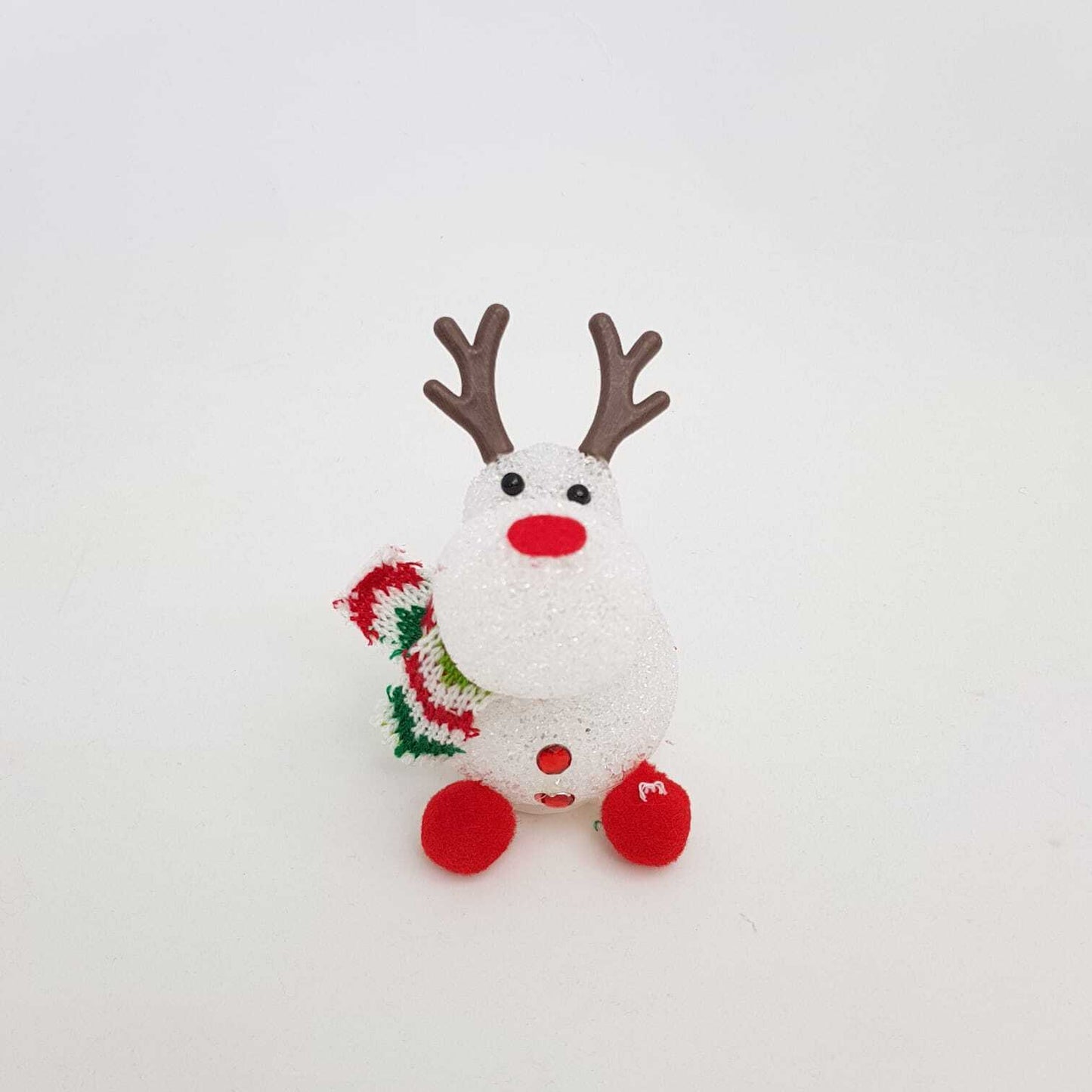 Acrylic Christmas reindeer decoration with a red nose and festive scarf for holiday home decor