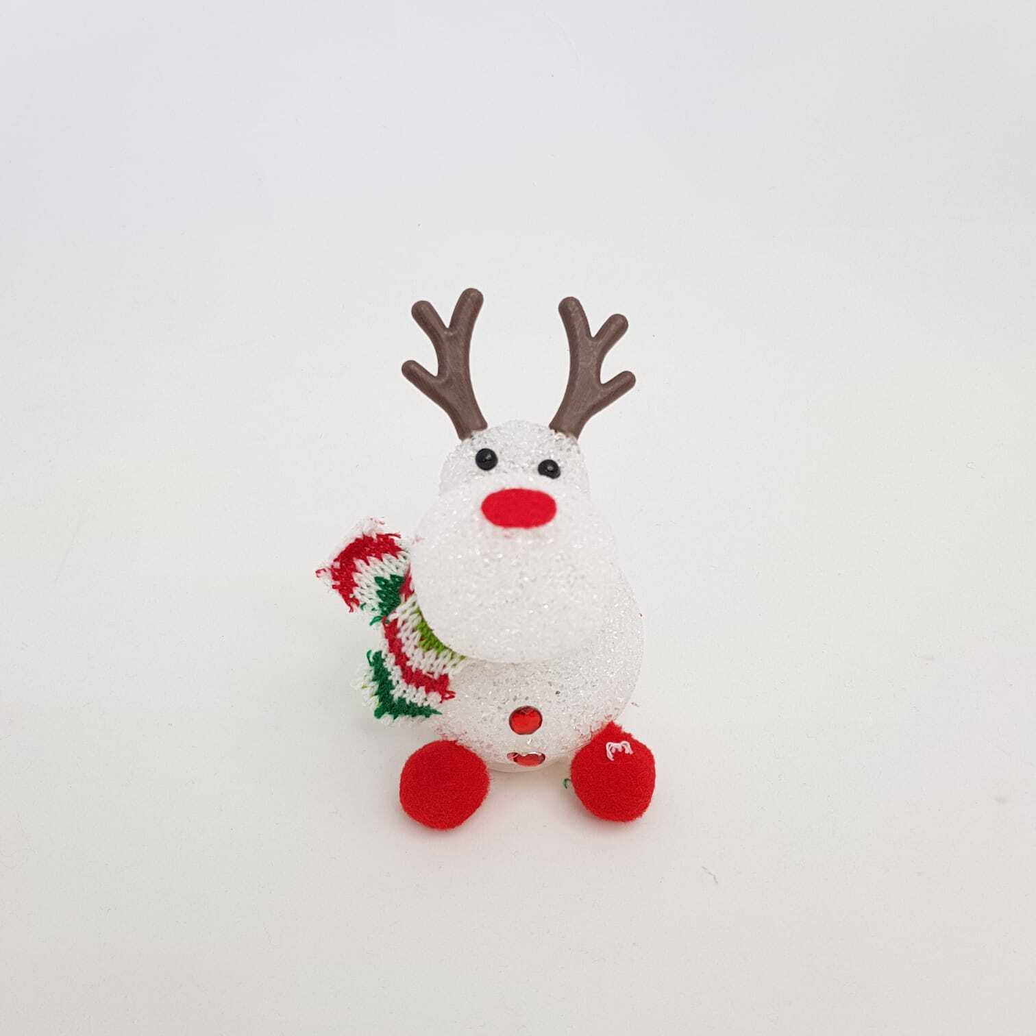 Acrylic Christmas reindeer decoration with a red nose and festive scarf for holiday home decor