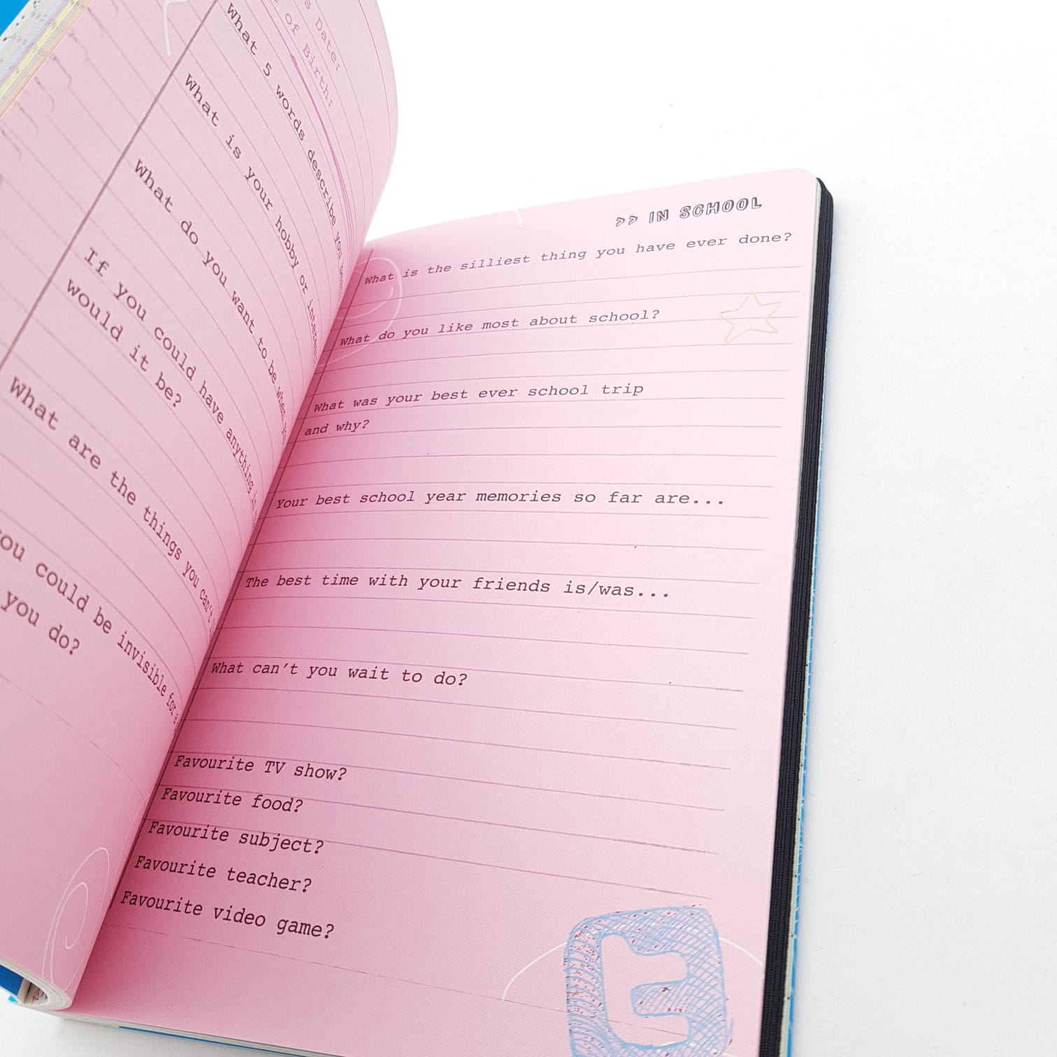 Open pink birthday memory book bundle page with prompts for school year and favorite activities by All About Everybody