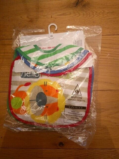 Colourful baby bibs set with fun animal designs, packaged for toddlers at The Trading Warehouse