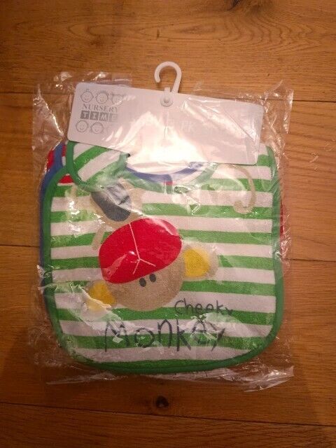 Pack of colourful baby bibs set with a playful monkey design for mealtime protection