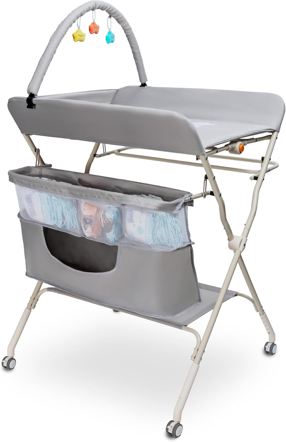 Goozie baby changing table with wheels featuring a soft surface and storage baskets for convenience