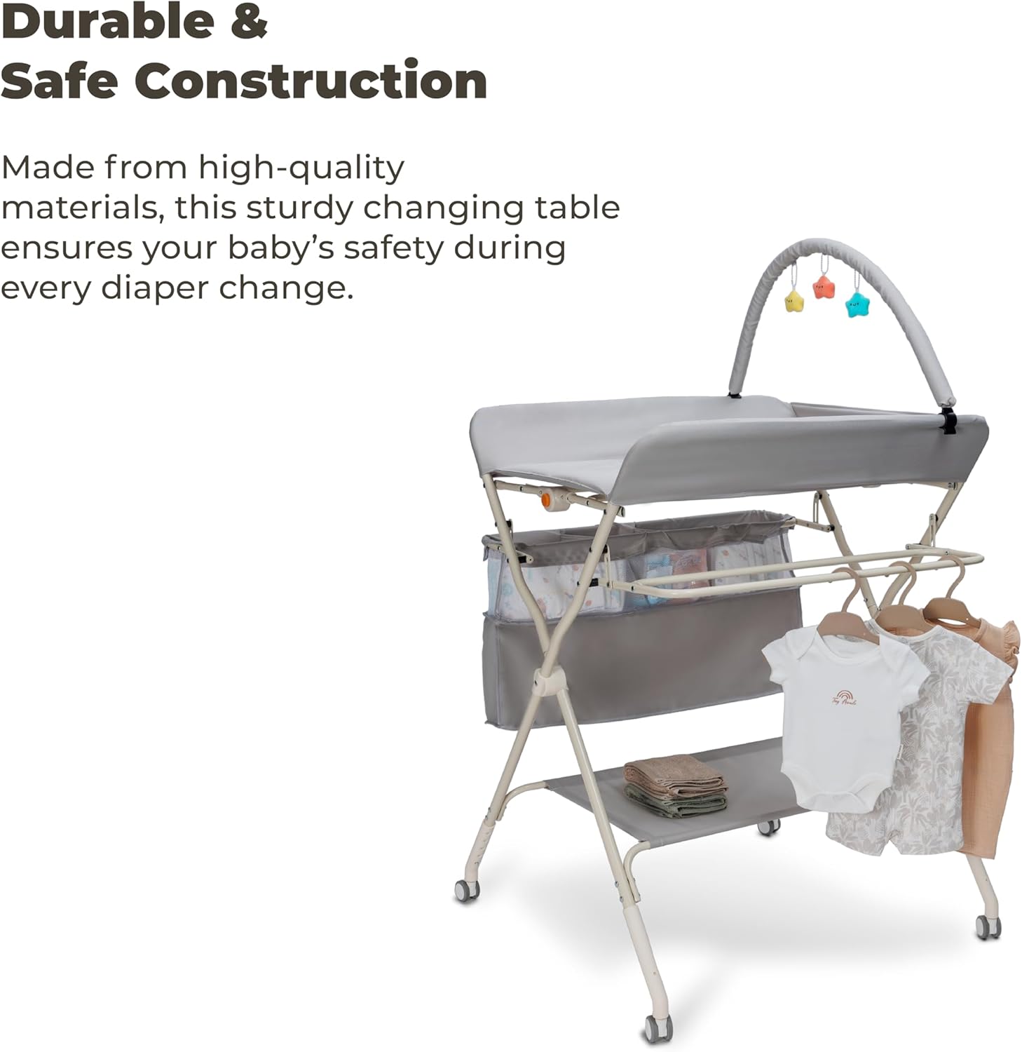 Goozie baby changing table with wheels featuring durable construction and storage for clothing and essentials