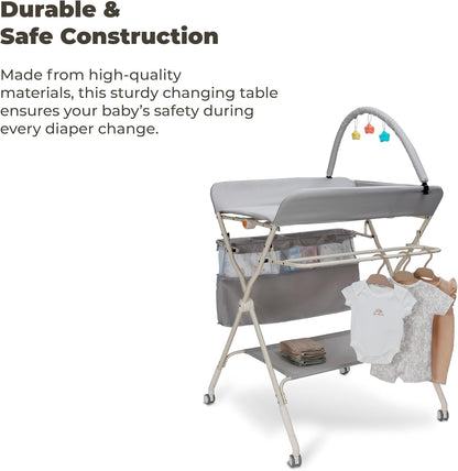 Goozie baby changing table with wheels featuring durable construction and storage for clothing and essentials
