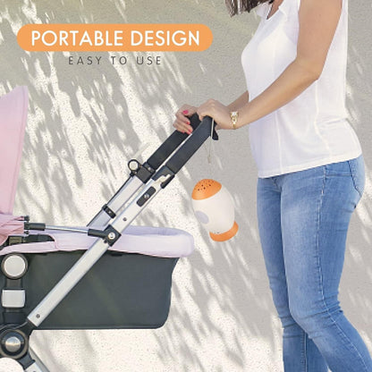Portable baby sleep soother with night light attached to a pram for easy use on the go