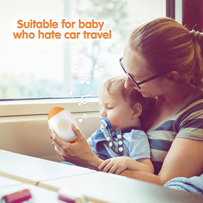 Mother using a baby sleep soother with night light to comfort her child during car travel
