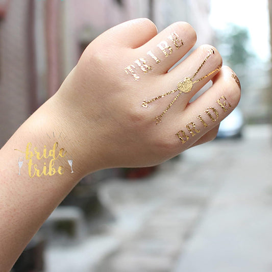 JEKUGOT bachelorette party accessories set with gold bride and bride tribe temporary tattoos on hand