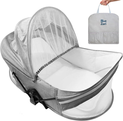 Blue Zeri portable baby travel bassinet with mosquito net and carry bag for easy transport