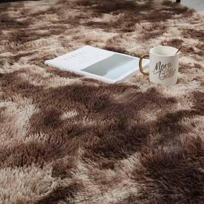 Brown fluffy area rug on a stylish living room floor with a magazine and mug beside it