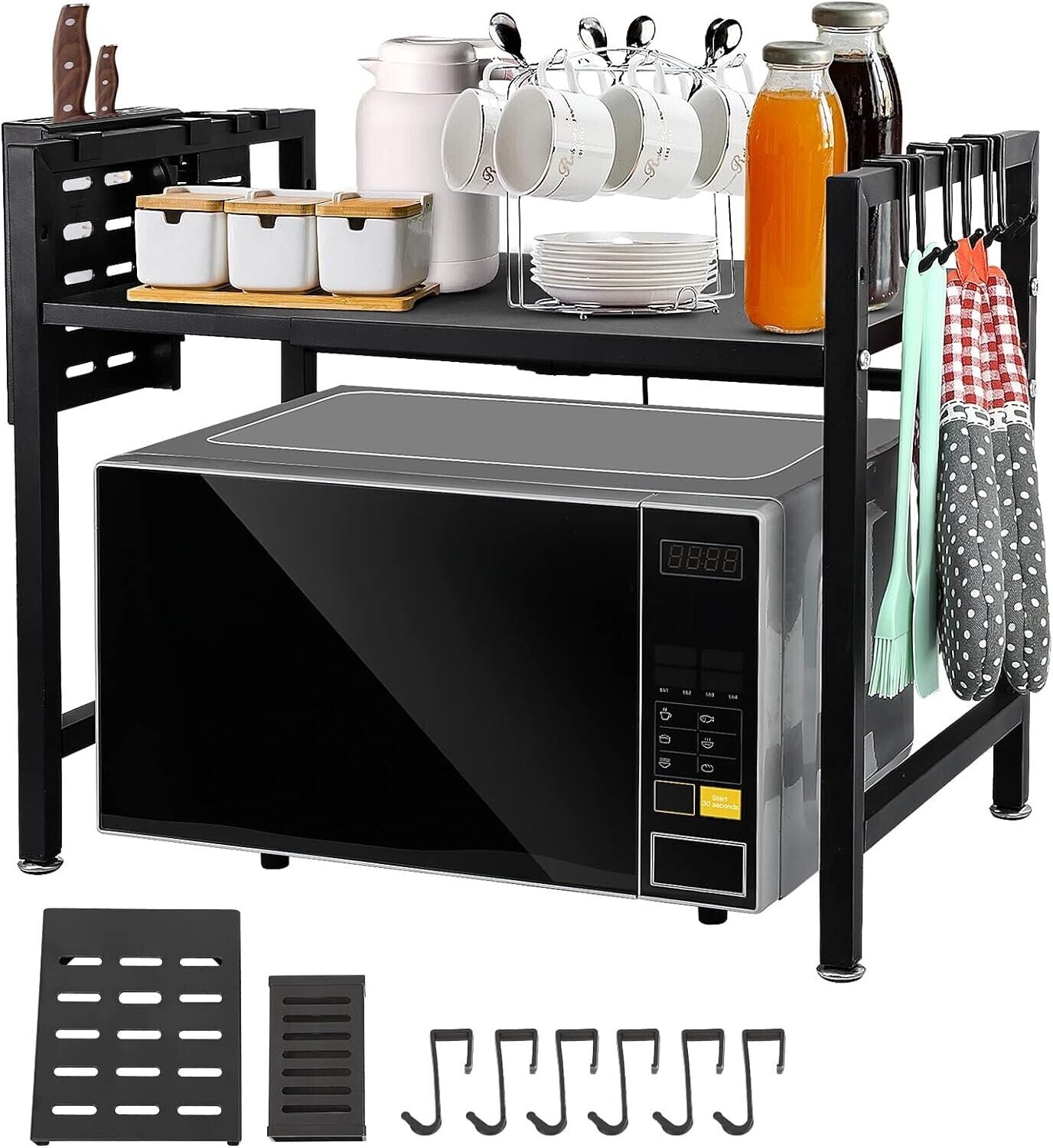 Expandable microwave oven rack with ample storage for kitchen essentials and hooks for utensils