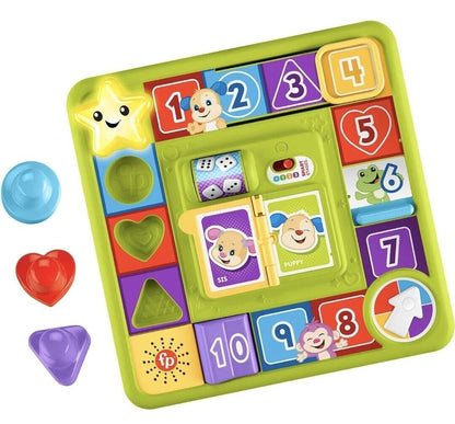 Fisher-Price interactive activity board with colourful shapes, dice, and characters for early learning
