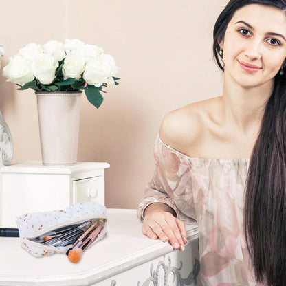 SiumPklay floral pencil case for girls with art supplies on a stylish vanity table