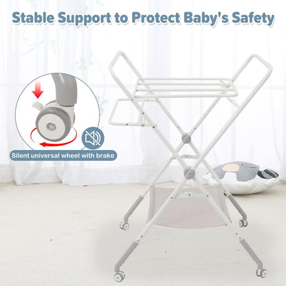 Foldable baby changing table with stable support and silent wheels for safety and convenience