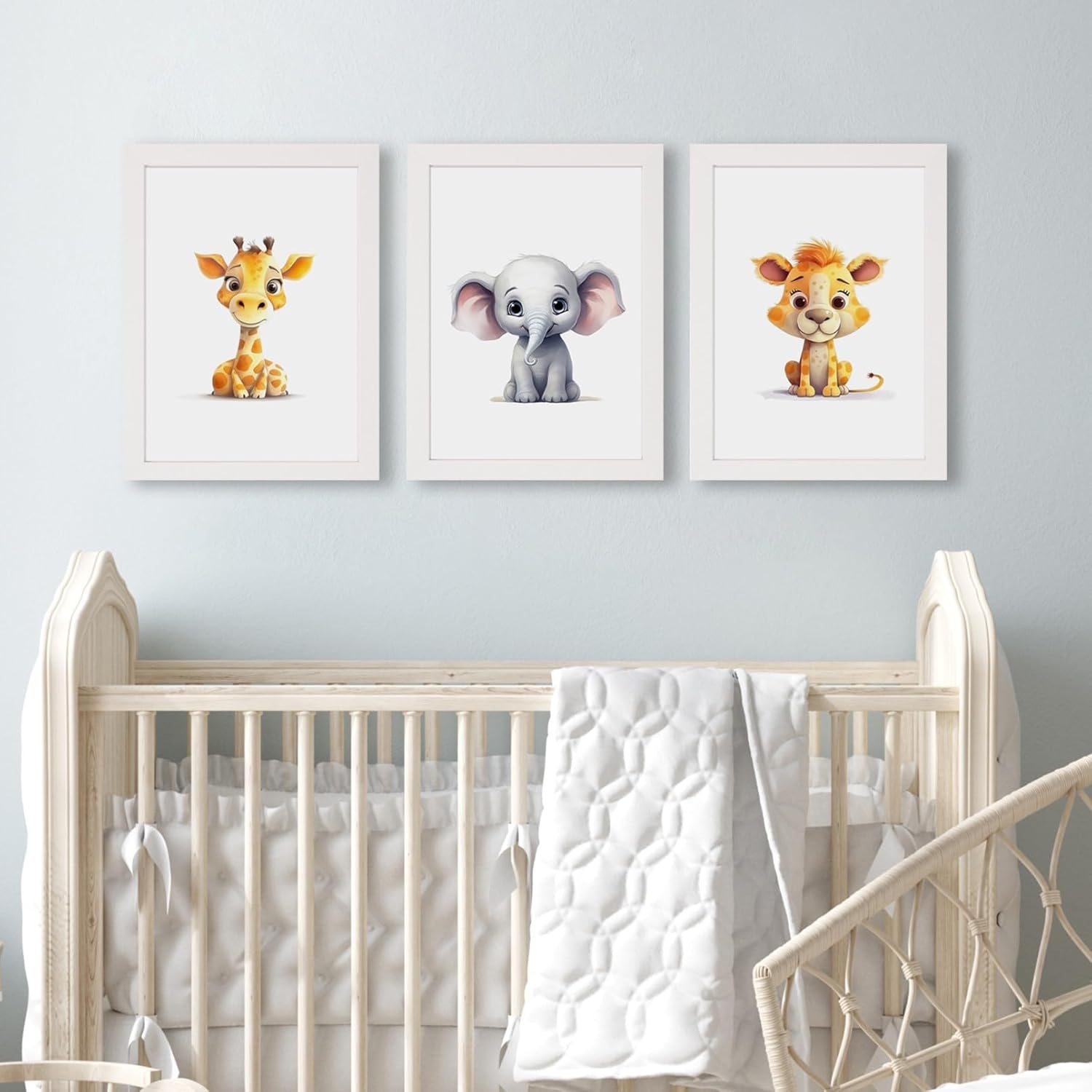 Hippoboo framed safari animal nursery prints featuring a giraffe, elephant, and lion for a playful decor