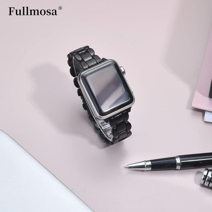 Black stainless steel Apple Watch strap with a sleek design and durable finish