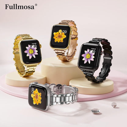 Four stylish Apple Watch straps in gold, silver, and black stainless steel for versatile looks